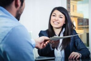 Legal intern handing out documents