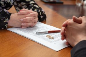 Signing a divorce, marriage dissolution documents