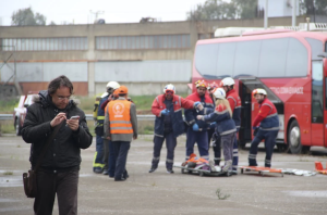 EMT helping bus accident