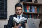 lawyer reading a law book