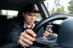 Driving car and using phone to text