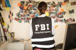 FBI woman works on a case.