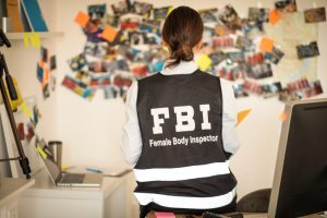 FBI woman works on a case.