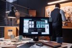 Background image of computer with case file on screen in detectives office