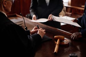 Close-up of accusation and protection sides with juridical documents