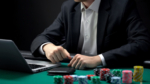 Businessman gambling on casino web site, betting all chips and wallet, addiction