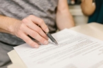 Person reviewing a legal document