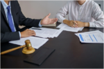 legal consultation between a lawyer and a client reviewing documents