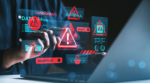 Man interacting with digital red warning icons and data graphics, futuristic style, dark background, concept of cybersecurity threats and data breaches