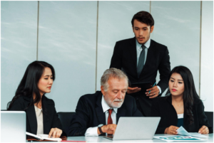 business team reviewing documents during a meeting