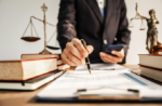 Lawyer signs document