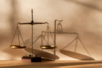 Golden scales of justice in a light and shadow drawing