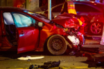 Severe Two-Car Crash on Street at Night