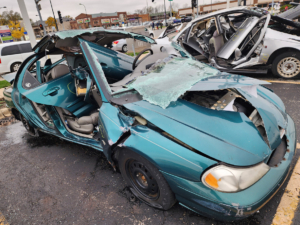 Broken Ford, angle view. Ford crashed in car accident. Ford car crash and damage. Damage of car in accident. Car crash insurance